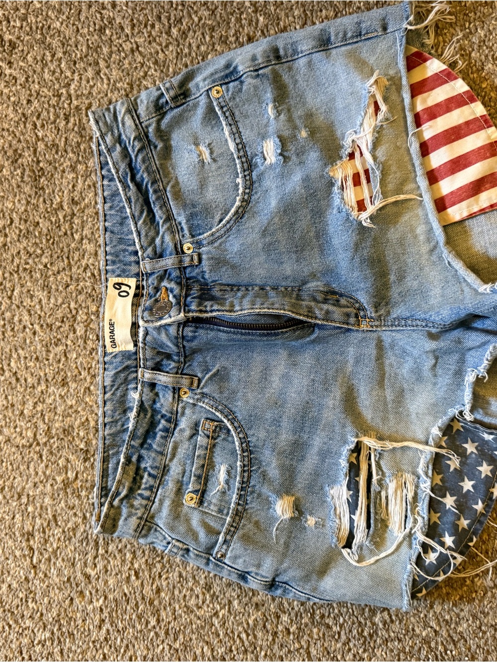 Garage Women's Light Blue Distressed Denim Shorts